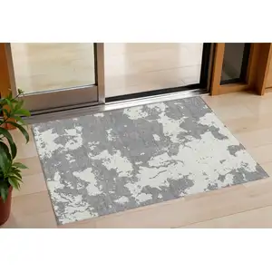 Photo of Gray And Ivory Abstract Washable Indoor Outdoor Area Rug