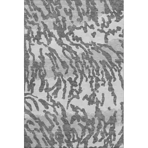 Photo of Gray And Ivory Animal Print Washable Area Rug With UV Protection