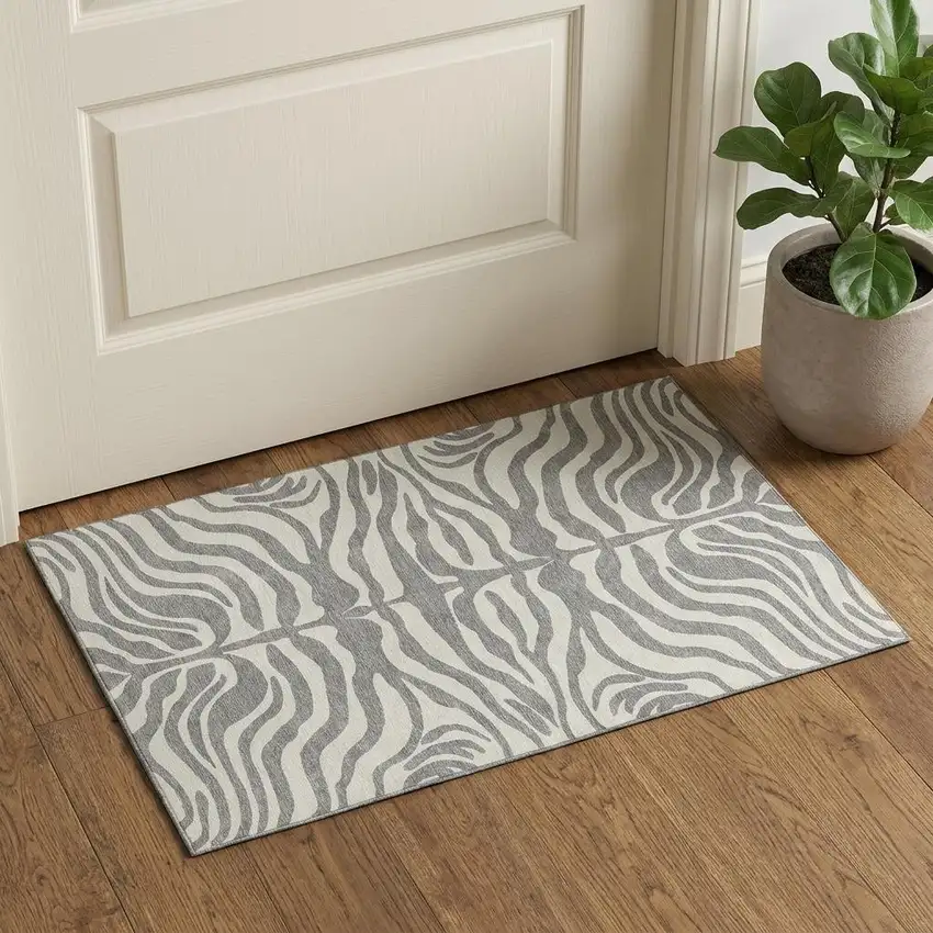 Gray And Ivory Animal Print Washable Area Rug With UV Protection Photo 1