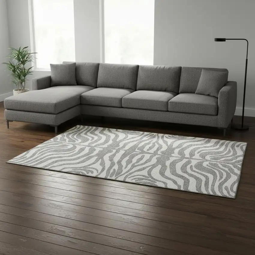 Gray And Ivory Animal Print Washable Area Rug With UV Protection Photo 2