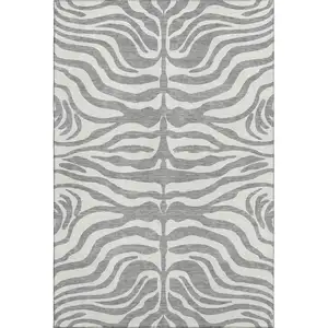Photo of Gray And Ivory Animal Print Washable Area Rug With UV Protection