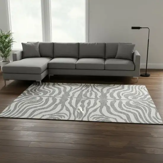 Gray And Ivory Animal Print Washable Area Rug With UV Protection Photo 2
