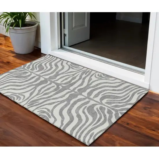 Gray And Ivory Animal Print Washable Indoor Outdoor Area Rug Photo 1