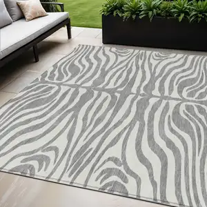 Photo of Gray And Ivory Animal Print Washable Indoor Outdoor Area Rug