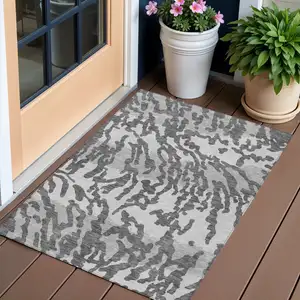 Photo of Gray And Ivory Animal Print Washable Indoor Outdoor Area Rug