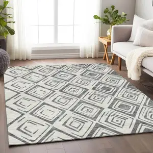 Photo of Gray And Ivory Diamond Washable Area Rug With UV Protection