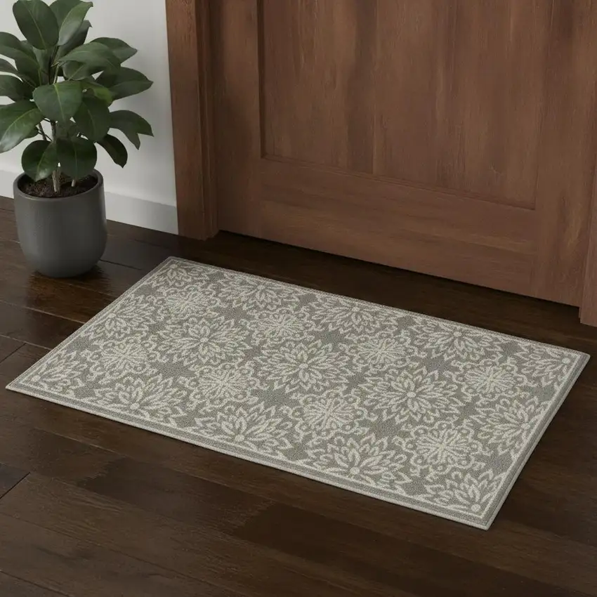 Gray And Ivory Floral Area Rug Photo 1