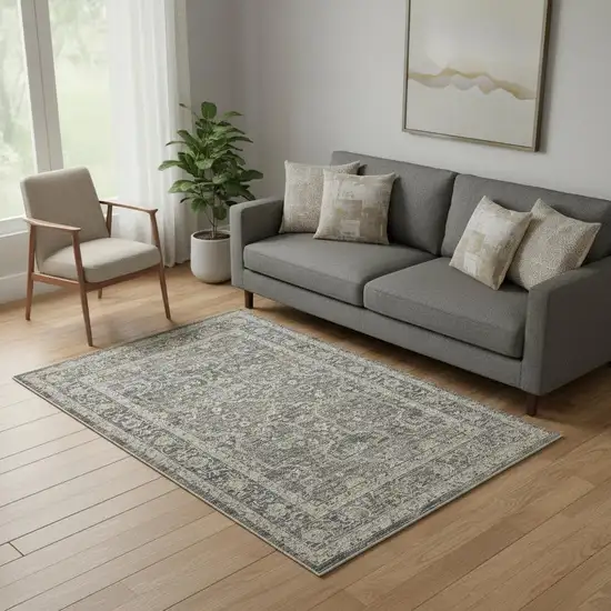 Gray And Ivory Floral Distressed Area Rug Photo 1