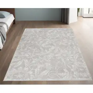 Photo of Gray And Ivory Floral Distressed Area Rug