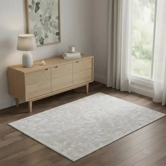 Gray And Ivory Floral Distressed Area Rug Photo 1