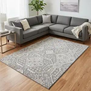 Photo of Gray And Ivory Floral Washable Area Rug With UV Protection