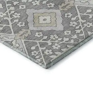 Photo of Gray And Ivory Floral Washable Area Rug With UV Protection