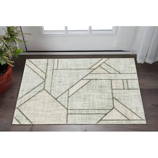 Gray And Ivory Geometric Power Loom Area Rug Photo 1