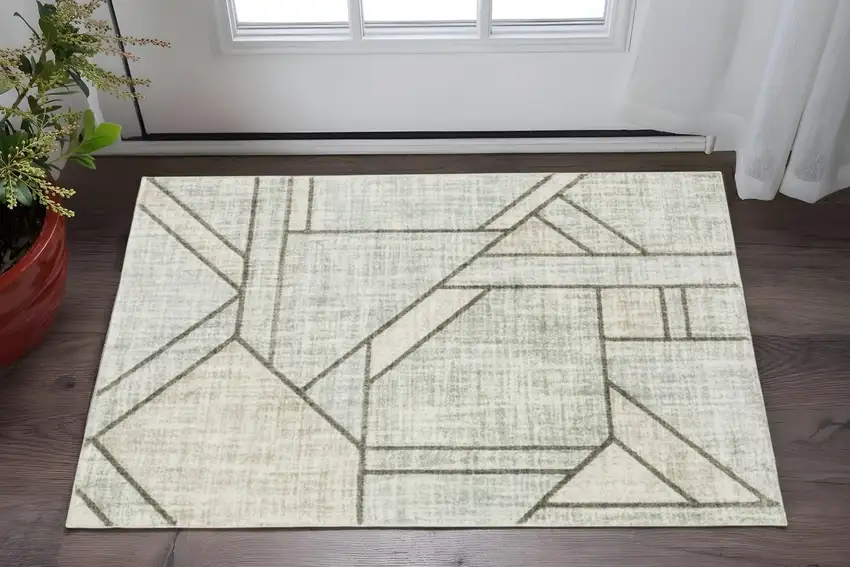 Gray And Ivory Geometric Power Loom Area Rug Photo 1