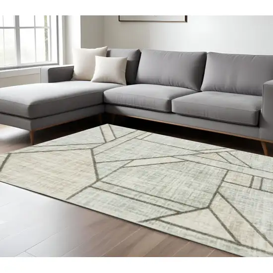 Gray And Ivory Geometric Power Loom Area Rug Photo 1