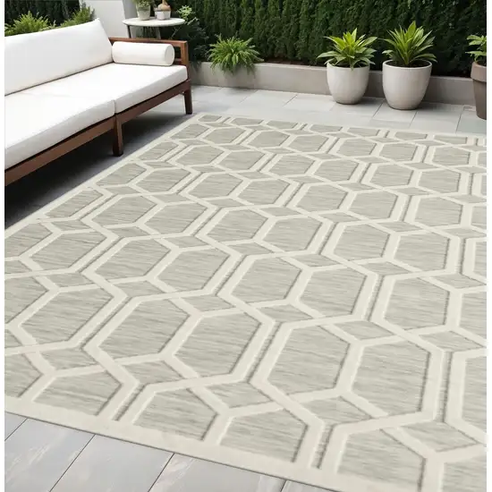 Gray And Ivory Geometric Stain Resistant Indoor Outdoor Area Rug Photo 1