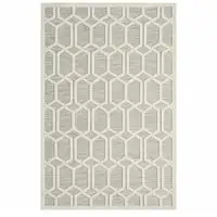 Photo of Gray And Ivory Geometric Stain Resistant Indoor Outdoor Area Rug