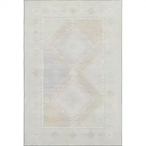 Photo of Gray And Ivory Geometric Washable Area Rug With UV Protection