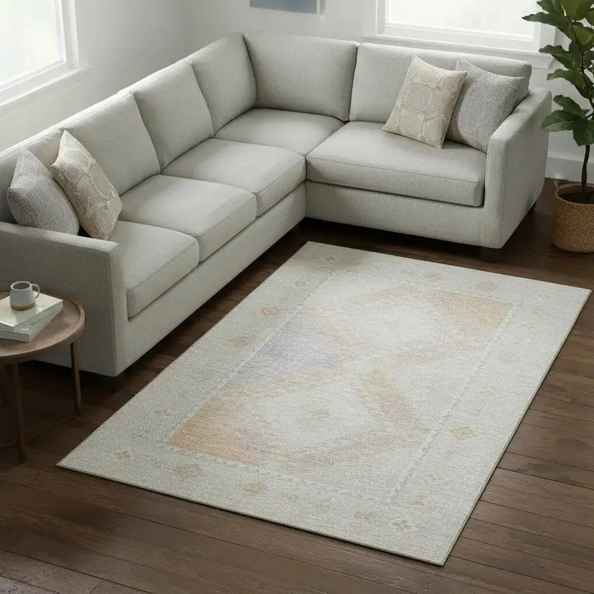 Gray And Ivory Geometric Washable Area Rug With UV Protection Photo 1