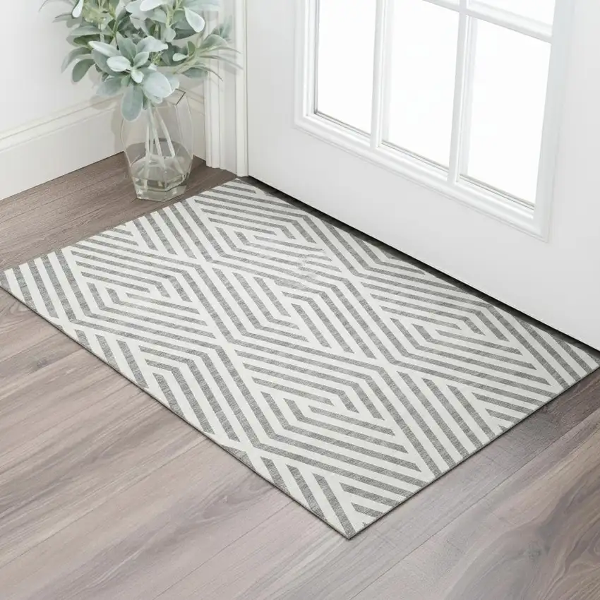 Gray And Ivory Geometric Washable Area Rug With UV Protection Photo 1