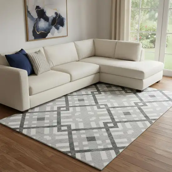 Gray And Ivory Geometric Washable Area Rug With UV Protection Photo 1