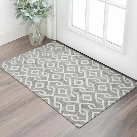 Gray And Ivory Geometric Washable Area Rug With UV Protection Photo 1