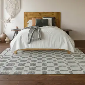 Photo of Gray And Ivory Geometric Washable Area Rug With UV Protection