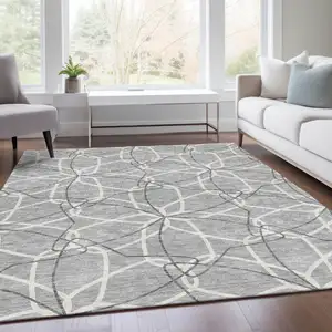 Photo of Gray And Ivory Geometric Washable Area Rug With UV Protection