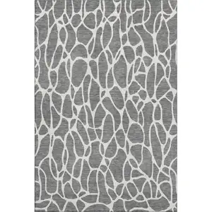 Photo of Gray And Ivory Geometric Washable Area Rug With UV Protection