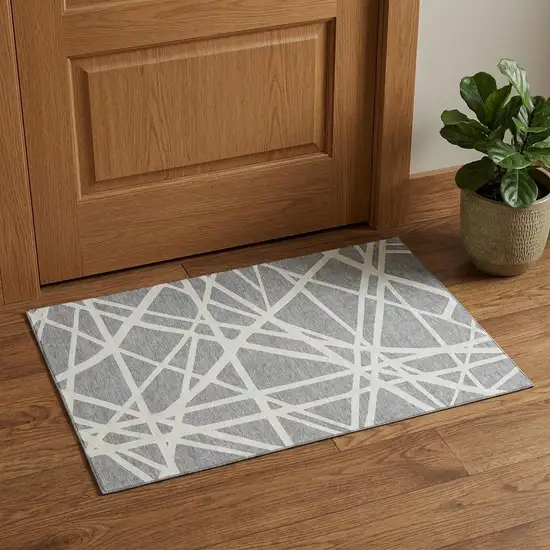 Gray And Ivory Geometric Washable Area Rug With UV Protection Photo 1
