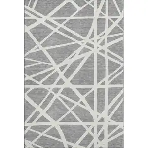 Photo of Gray And Ivory Geometric Washable Area Rug With UV Protection