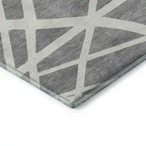 Photo of Gray And Ivory Geometric Washable Area Rug With UV Protection