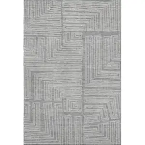 Photo of Gray And Ivory Geometric Washable Area Rug With UV Protection