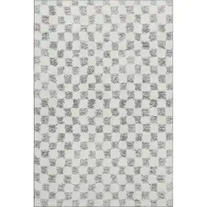 Photo of Gray And Ivory Geometric Washable Area Rug With UV Protection