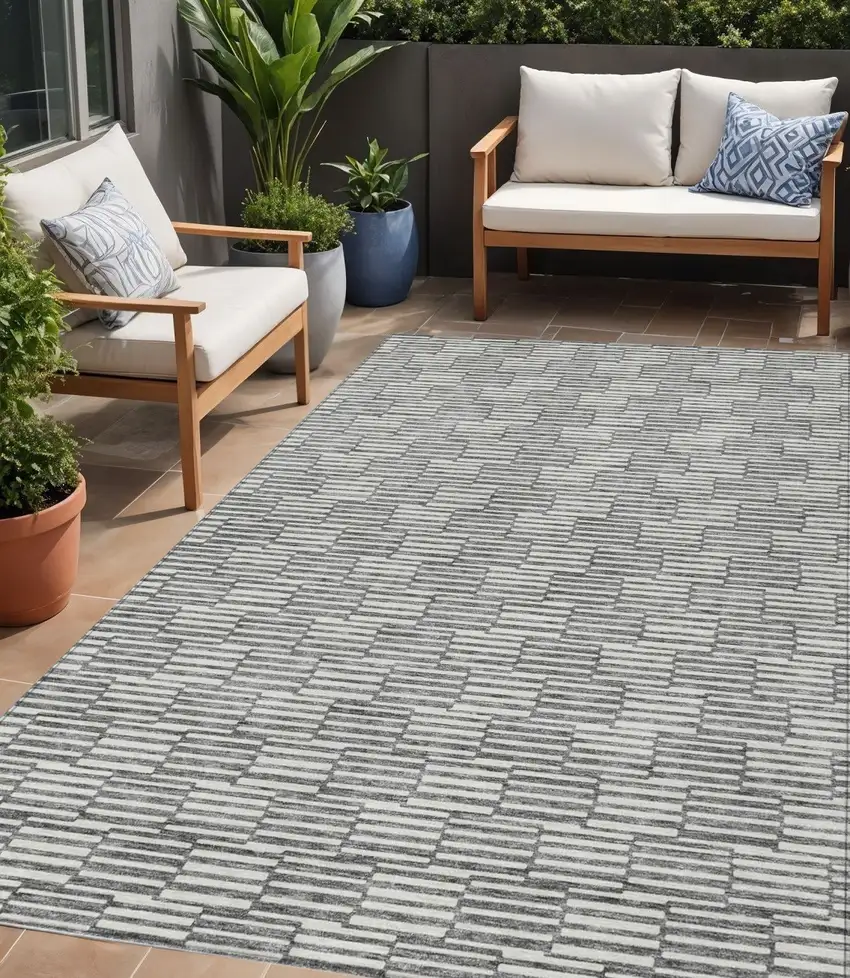 Gray And Ivory Geometric Washable Indoor Outdoor Area Rug Photo 1