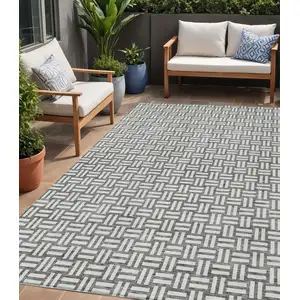 Photo of Gray And Ivory Geometric Washable Indoor Outdoor Area Rug