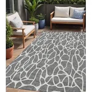 Photo of Gray And Ivory Geometric Washable Indoor Outdoor Area Rug