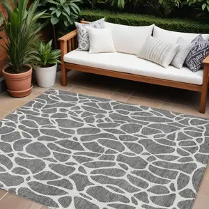 Photo of Gray And Ivory Geometric Washable Indoor Outdoor Area Rug