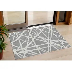 Photo of Gray And Ivory Geometric Washable Indoor Outdoor Area Rug
