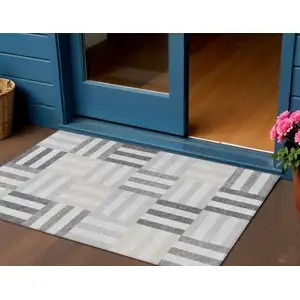 Photo of Gray And Ivory Geometric Washable Indoor Outdoor Area Rug