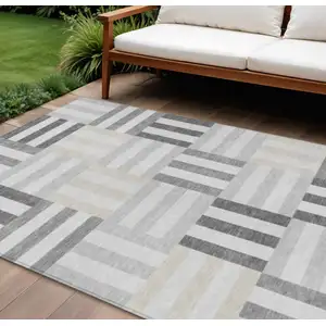 Photo of Gray And Ivory Geometric Washable Indoor Outdoor Area Rug