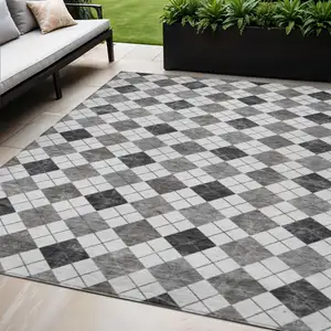 Photo of Gray And Ivory Geometric Washable Indoor Outdoor Area Rug
