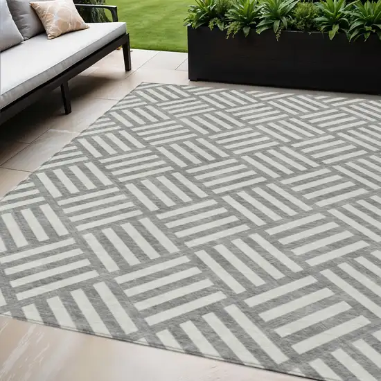 Gray And Ivory Geometric Washable Indoor Outdoor Area Rug Photo 1