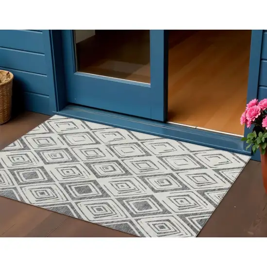 Gray And Ivory Geometric Washable Indoor Outdoor Area Rug Photo 1