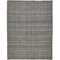 Photo of Gray And Ivory Hand Woven Area Rug