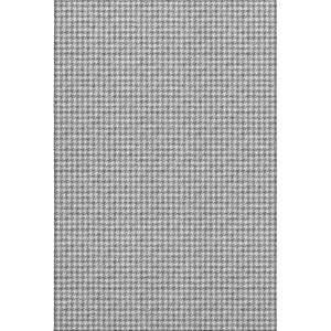 Photo of Gray And Ivory Houndstooth Washable Area Rug With UV Protection