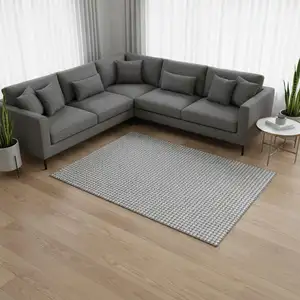 Photo of Gray And Ivory Houndstooth Washable Area Rug With UV Protection