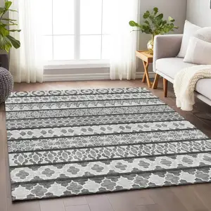 Photo of Gray And Ivory Ikat Washable Area Rug With UV Protection