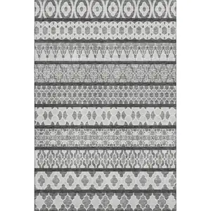 Photo of Gray And Ivory Ikat Washable Area Rug With UV Protection