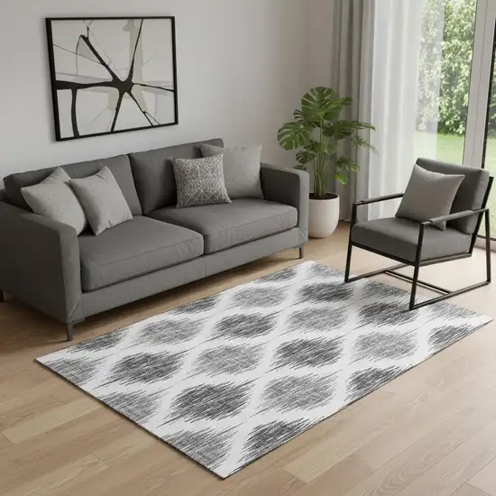 Gray And Ivory Ikat Washable Area Rug With UV Protection Photo 1